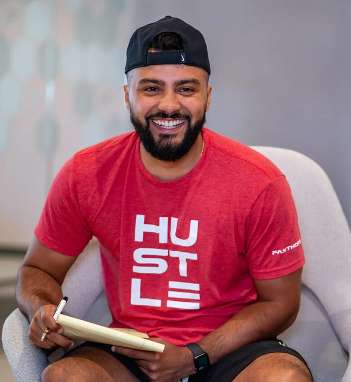 A Fastmore employee smiling. 